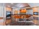 Open kitchen design with granite counters, stainless steel appliances, and a central island at 11002 Inverlochy Ct, Las Vegas, NV 89141