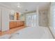 Elegant bathroom with a jetted tub, separate shower, dual vanities, and plantation shutters at 11002 Inverlochy Ct, Las Vegas, NV 89141