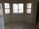 Bright dining area featuring a large window and tile floors at 1105 Sulphur Springs Ln # 102, Las Vegas, NV 89128