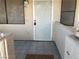 Tiled front patio with a decorative metal security door at 1105 Sulphur Springs Ln # 102, Las Vegas, NV 89128