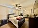 Tranquil bedroom with neutral tones, mirrored closet doors, and a ceiling fan for added comfort at 1105 Sulphur Springs Ln # 202, Las Vegas, NV 89128