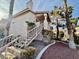 Exterior view of home with stone landscaping and stairs leading up to the front door at 1105 Sulphur Springs Ln # 202, Las Vegas, NV 89128