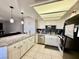 Spacious kitchen showcasing modern appliances, granite countertops, and ample storage at 1105 Sulphur Springs Ln # 202, Las Vegas, NV 89128
