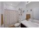 Bathroom including shower with curtain, sink with mirror and decor at 1135 Tektite Ave, Henderson, NV 89011