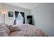 Bedroom with closet and blackout curtains on a bright window at 1135 Tektite Ave, Henderson, NV 89011