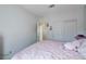 Bedroom displaying closet with adjacent doorway and pink bedding at 1135 Tektite Ave, Henderson, NV 89011