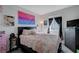 Bedroom featuring bed, window with black curtains, and black dresser at 1135 Tektite Ave, Henderson, NV 89011