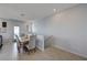 Bright dining area with seating for six, tile flooring, and natural light at 1135 Tektite Ave, Henderson, NV 89011