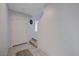 Inviting entryway featuring tile flooring, white front door, and staircase access at 1135 Tektite Ave, Henderson, NV 89011