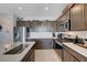 Beautiful kitchen with stainless steel appliances, stylish cabinets, and a bright atmosphere at 1135 Tektite Ave, Henderson, NV 89011