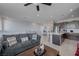 Expansive living space showcasing an open floor plan connecting the living room, kitchen, and dining area at 1135 Tektite Ave, Henderson, NV 89011