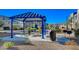 A lovely picnic spot with covered tables, bbq, and trashcan, perfect for community gatherings and outdoor dining at 1135 Tektite Ave, Henderson, NV 89011
