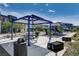 Charming picnic area with tables, grill, and playground in a community setting at 1135 Tektite Ave, Henderson, NV 89011