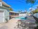 Lush backyard showcasing a sparkling pool, outdoor seating, and well-maintained landscaping at 1139 5Th Pl, Las Vegas, NV 89104