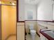 Well-maintained bathroom featuring a glass shower and matching tile accents at 1139 5Th Pl, Las Vegas, NV 89104