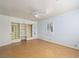 Bedroom with hardwood floors, a ceiling fan, and built-in shelving unit at 1139 5Th Pl, Las Vegas, NV 89104