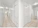 Bright hallway featuring built-in storage cabinets and tile floors, offering ample space at 1139 5Th Pl, Las Vegas, NV 89104
