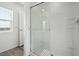 Clean bathroom featuring glass-enclosed shower with new finishes and fixtures at 1660 Desert Path Ave, North Las Vegas, NV 89032
