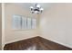 Cozy dining area features hardwood floors, natural light, and elegant lighting at 2100 Quarry Ridge St # 106, Las Vegas, NV 89117
