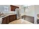 Well-equipped kitchen features stainless steel appliances and seamless flow into dining at 2100 Quarry Ridge St # 106, Las Vegas, NV 89117