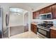 Open-concept kitchen offers stainless steel appliances and convenient dining area access at 2100 Quarry Ridge St # 106, Las Vegas, NV 89117