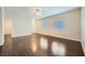 Inviting living room with hardwood floors, natural light, and a neutral color scheme at 2100 Quarry Ridge St # 106, Las Vegas, NV 89117