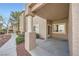 Covered patio features a pillar, concrete flooring, and view of the landscaped courtyard at 2100 Quarry Ridge St # 106, Las Vegas, NV 89117