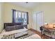 Bedroom with hardwood floors, natural light, closet and a desk at 2152 Mountain City St, Henderson, NV 89052