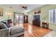 Cozy living room with sliding glass doors, stylish furniture, and laminate flooring at 2152 Mountain City St, Henderson, NV 89052