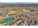 Aerial view of a Gathering-friendly neighborhood featuring tennis courts, athletic fields, and community amenities at 2345 Gondi Castle Ave, Henderson, NV 89044