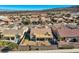 Picture of a backyard featuring desert landscaping, a covered patio, and perimeter fencing at 2345 Gondi Castle Ave, Henderson, NV 89044