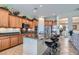 Kitchen features stainless steel appliances, granite countertops, and breakfast bar with seating at 2345 Gondi Castle Ave, Henderson, NV 89044