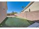 A backyard putting green with neatly manicured turf and clearly marked holes at 2345 Gondi Castle Ave, Henderson, NV 89044