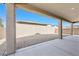 Covered patio featuring stone pillars and a view of the backyard at 2404 Elmont Ave, North Las Vegas, NV 89086