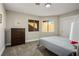 Cozy bedroom with carpet and a window offering natural light at 2517 Desert Glen Dr, Las Vegas, NV 89134