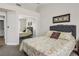 Well-lit bedroom with a comfortable bed, mirrored closet, and neutral decor, creating a peaceful retreat at 2517 Desert Glen Dr, Las Vegas, NV 89134