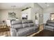 Bright and airy living room with an open floor plan, seamlessly connecting to the dining and kitchen areas at 2517 Desert Glen Dr, Las Vegas, NV 89134