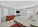 Inviting bedroom features a comfortable bed, dresser, and bright windows at 2587 Tolmezzo St, Henderson, NV 89044