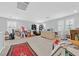 Large bonus room with neutral carpet and bright natural light at 2587 Tolmezzo St, Henderson, NV 89044
