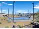 View of the community park, highlighting amenities like a playground, picnic areas, and walking paths at 2587 Tolmezzo St, Henderson, NV 89044