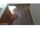 Bathroom showcasing a toilet, wood-look floors and a vanity at 3435 Villa Knolls South Dr, Las Vegas, NV 89120