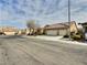 Inviting single-story home with a three-car garage and desert-friendly landscaping at 3581 Rio Paloma Ct, North Las Vegas, NV 89031