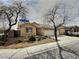 Attractive single-story home showcasing a three-car garage and drought-tolerant landscaping at 3581 Rio Paloma Ct, North Las Vegas, NV 89031