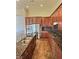 Gourmet kitchen features granite countertops, stainless appliances, large island with sink, and custom cabinets at 3581 Rio Paloma Ct, North Las Vegas, NV 89031