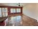 Cozy living area with tile floors, slider door, and bright windows at 3581 Rio Paloma Ct, North Las Vegas, NV 89031