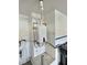 Compact utility area with a modern water heater, utility sink and connections, and a convenient storage nook at 3581 Rio Paloma Ct, North Las Vegas, NV 89031