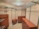 Custom walk-in closet with abundant shelving and drawer space, offering lots of storage and organization at 3581 Rio Paloma Ct, North Las Vegas, NV 89031
