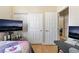 Bedroom with a closet and a doorway, creating a comfortable and functional space at 4033 Bliss Canyon Ct, Las Vegas, NV 89129