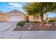 Charming single-story home with a well-maintained yard and mature landscaping at 4033 Bliss Canyon Ct, Las Vegas, NV 89129