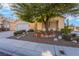 Lovely single-story home featuring a manicured front yard with desert-friendly landscaping at 4033 Bliss Canyon Ct, Las Vegas, NV 89129